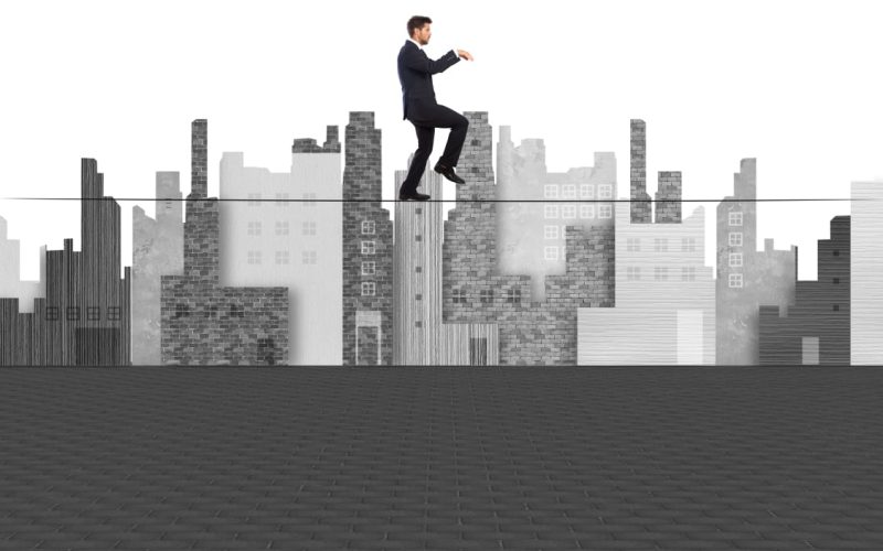 Man walking on tight rope